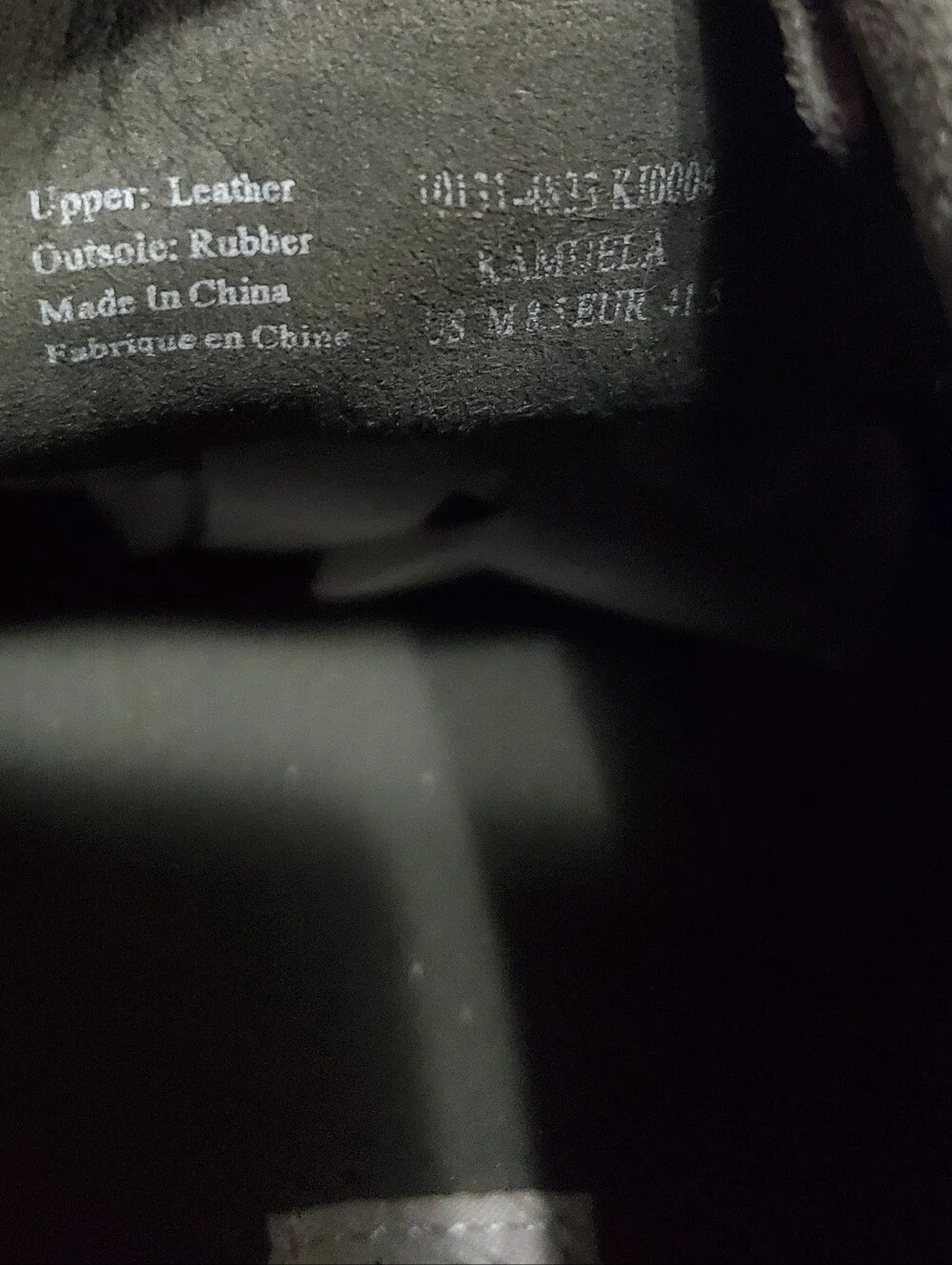 OluKai brown some shoes